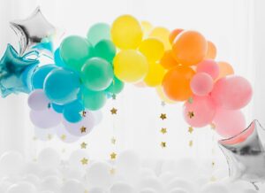 blue and yellow balloons with white clouds